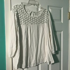 White top with floral detail